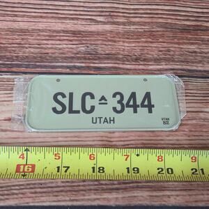 Vintage 1880s mini steel bicycle license plate UTAH sealed